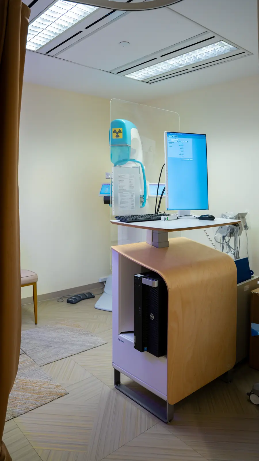 Imaging workstation in front of the mammography unit at Fusion Medical