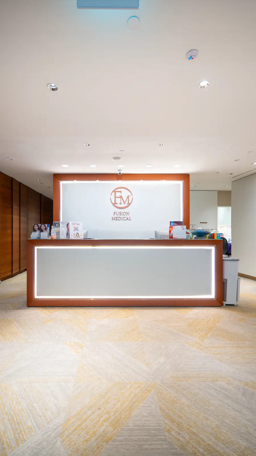 Fusion Medical reception desk and logo
