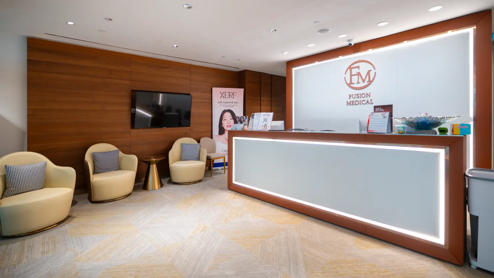 Reception desk and lounge armchairs at Fusion Medical, Wheelock Place