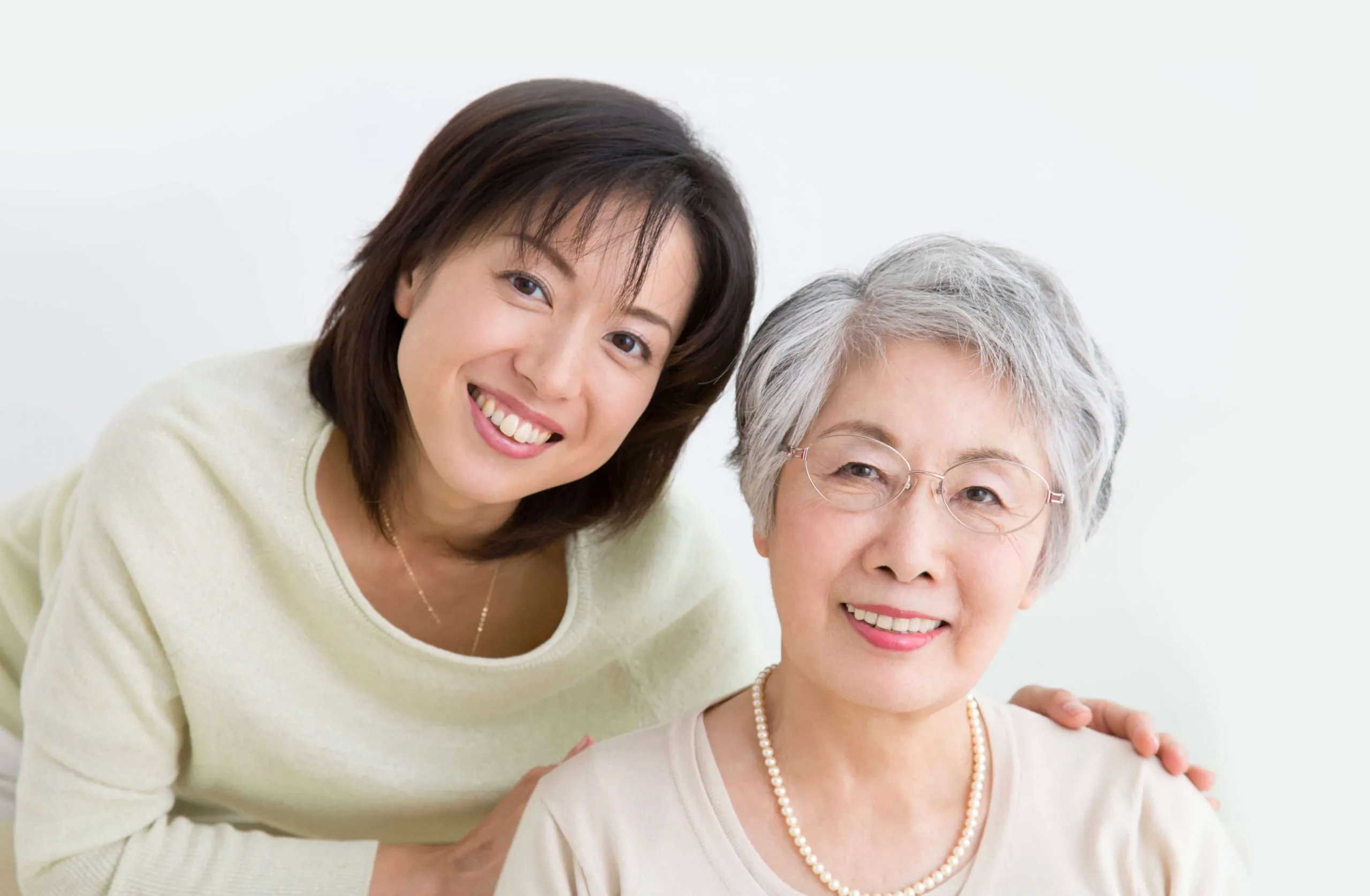Adult daughter with her older mother